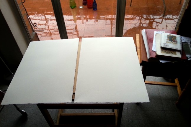 A full sheet torn in two.