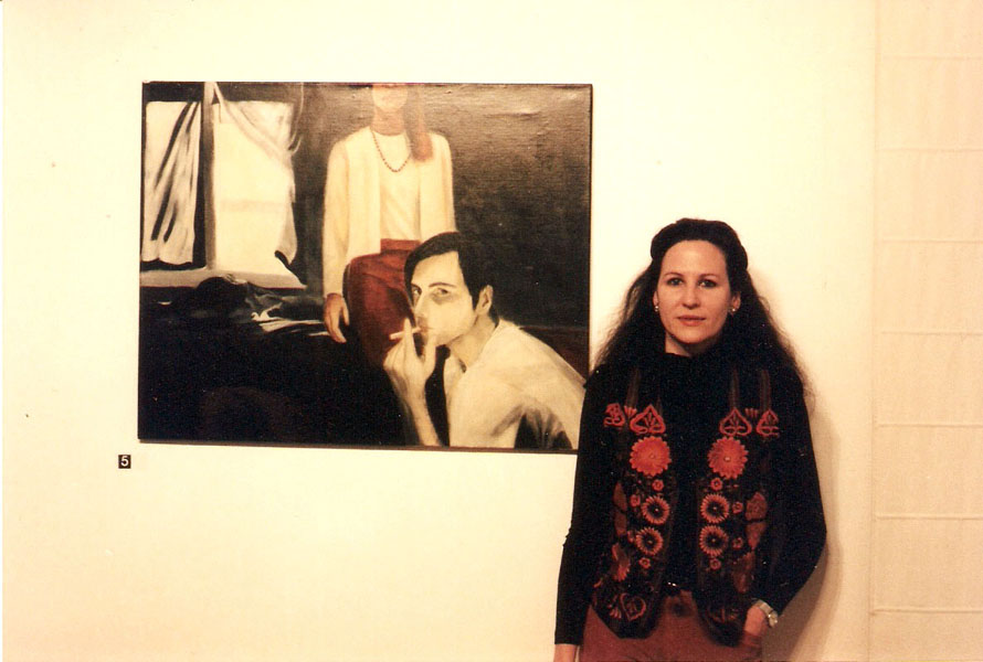 Young woman in front of painting