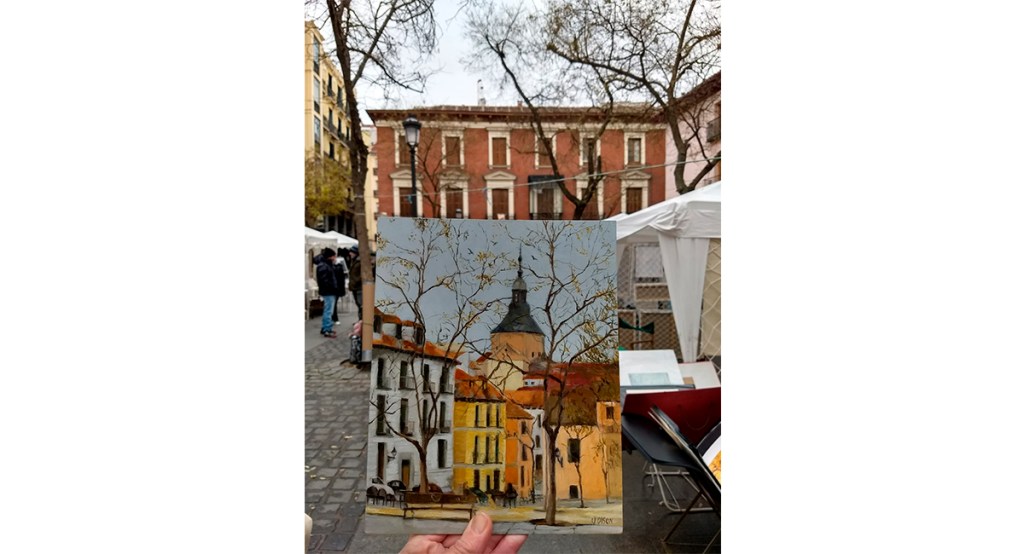 A small painting held in my hand for size reference of Plaza de la Paja in Madrid Spain